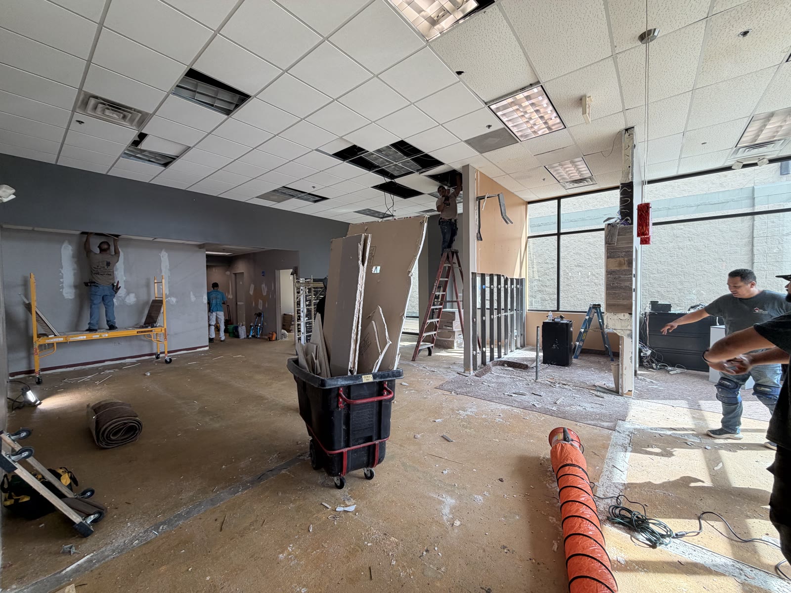 Crew working on ceiling during renovation